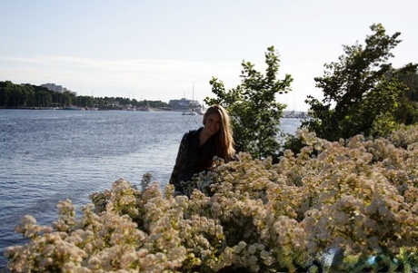 Slim amateur uncovers her small tits in blue jeans during homemade action