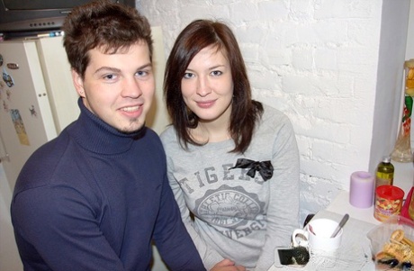 Brunette amateur holds her boobs while sucking cock after fucking