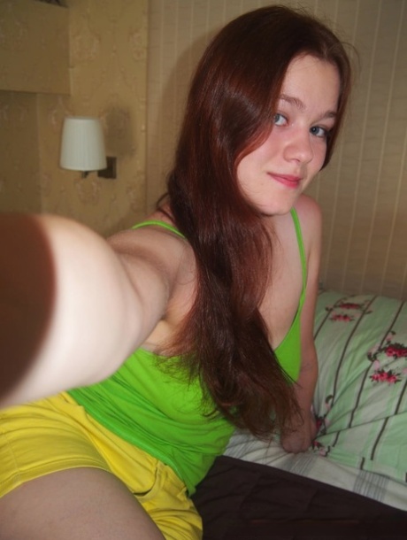 Busty amateur babe posing naked in front of her webcam in a compilation