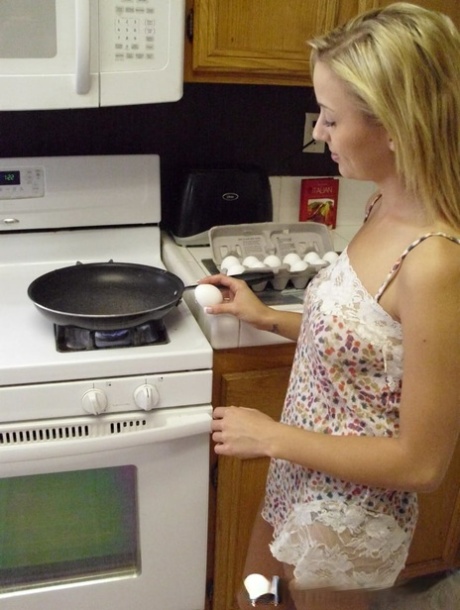 Pretty amateur wife Katty West strips and shows her big tits while cooking