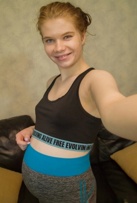 Naughty pregnant babe takes nude selfies showing her small tits