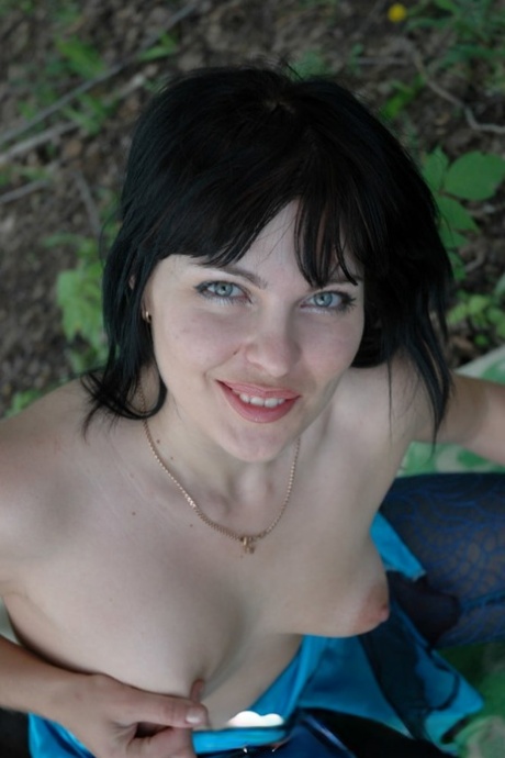 Kinky amateur mom posing pantyless in her hot lingerie in the forest