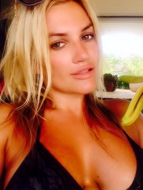 Blonde amateur shows off her juicy breasts & pussy while taking nude selfies