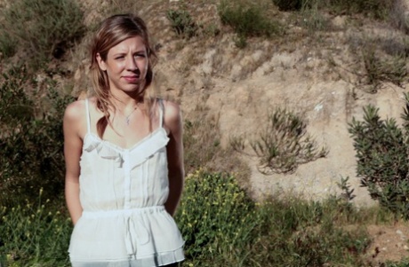 Young blonde Chastity Lynn gives a public blowjob to her man in the car