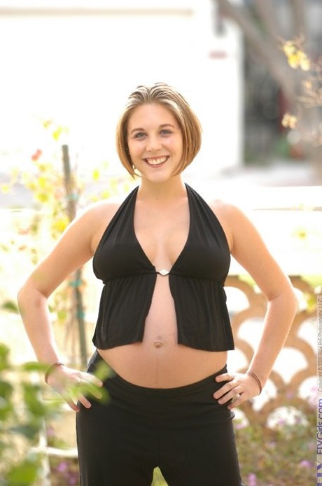 Pregnant lady Violet exposes her boobs and fondles her swollen vagina