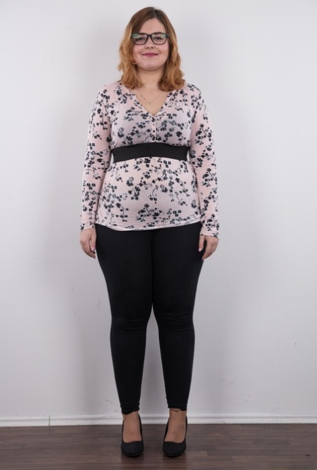 Amateur fatty Karolina shows her flab in the nude wit her glasses on