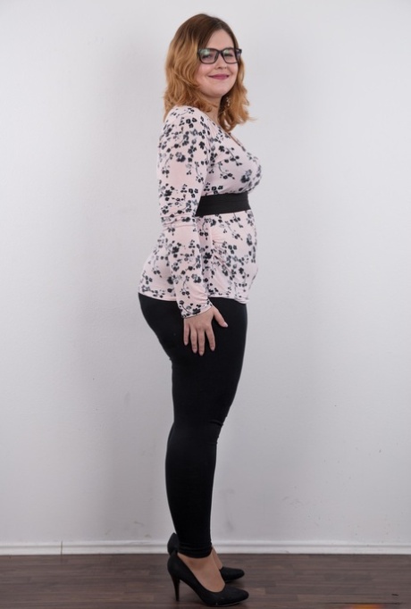 Amateur fatty Karolina shows her flab in the nude wit her glasses on