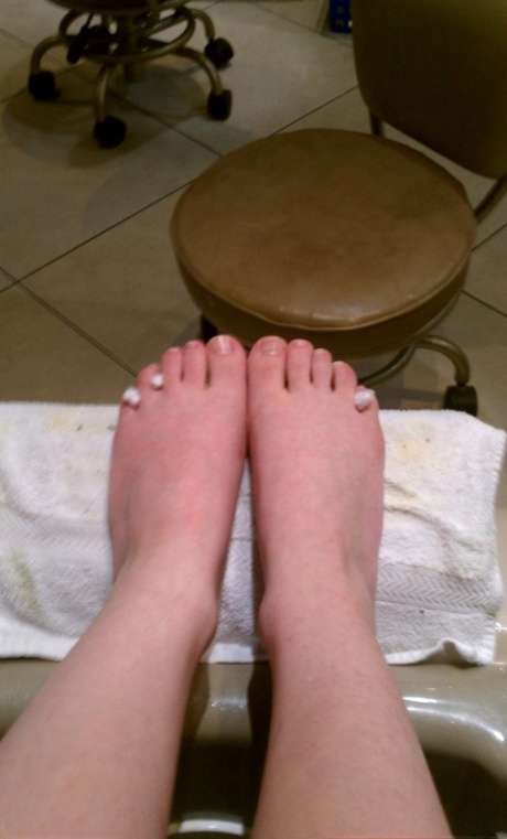 Amateur girl Danielle takes safe for work self shots around her house