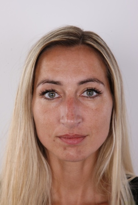 Blonde amateur with firm tits undresses for nude modeling gig