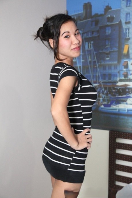 Filipina first timer Ladyhoney holds her medium boobs after getting naked