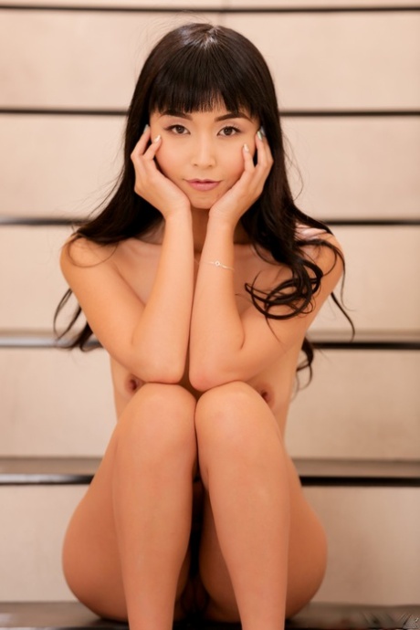 Hot Asian girl Marica Hase flaunts her perfect ass after sexy striptease