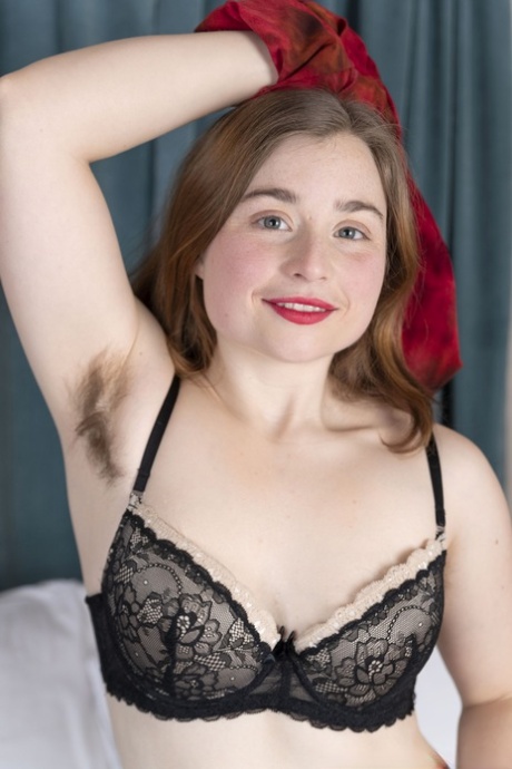 Petite guitar player Dawn Honey Crisp massages her hairy crotch as she strips