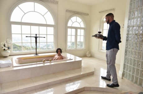 Enticing all natural Bethany Benz gives bathtub blowjob & has big tits creamed