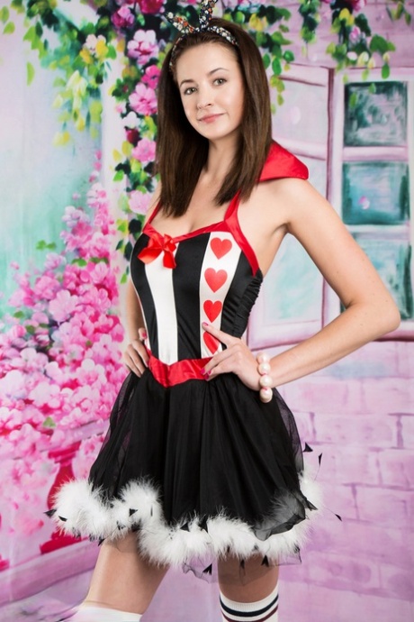 Hot brunette Mika doffs her costume to reveal her nice big tits & perfect ass