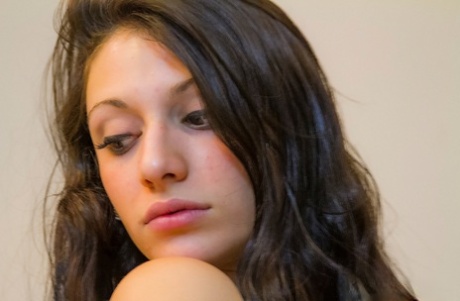 Naked brunette Gina Rose fondles her nice boobs and hard nipples in the shower