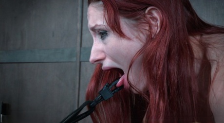 Hot slave Violet Monroe bound with nipple & tongue clamps for BDSM torture