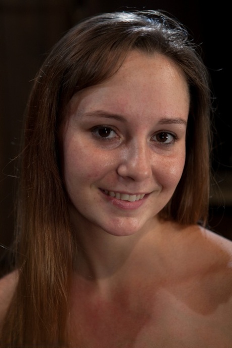 Adorable beauty Sasha gets bound to a metal construction and toyed