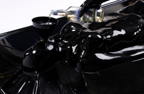 Collection of women modelling the latest in latex fashions