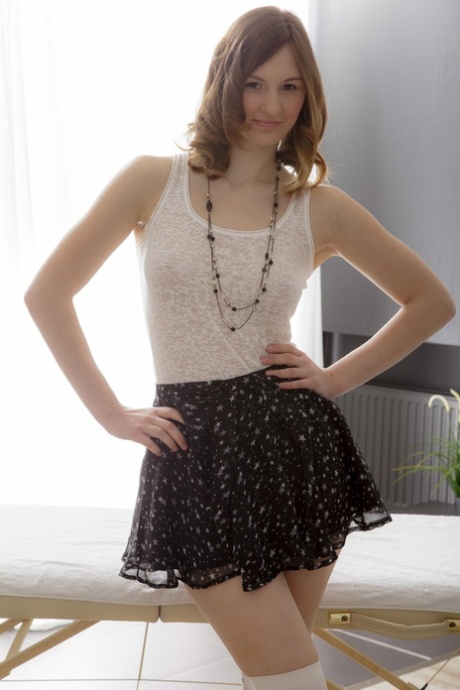 Naked young woman gets a massage like she's never had before