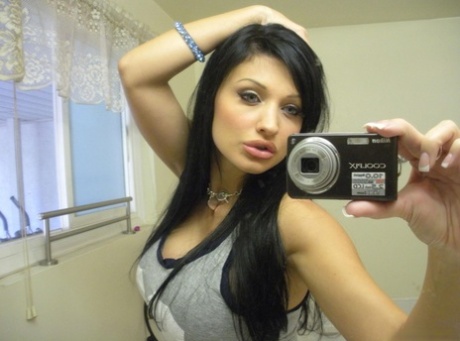 European chick Aletta Ocean takes topless selfies in mirror wearing a thong