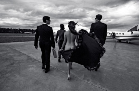 Curvy centerfold Taiana Camargo with big tits lounges nude with her cash