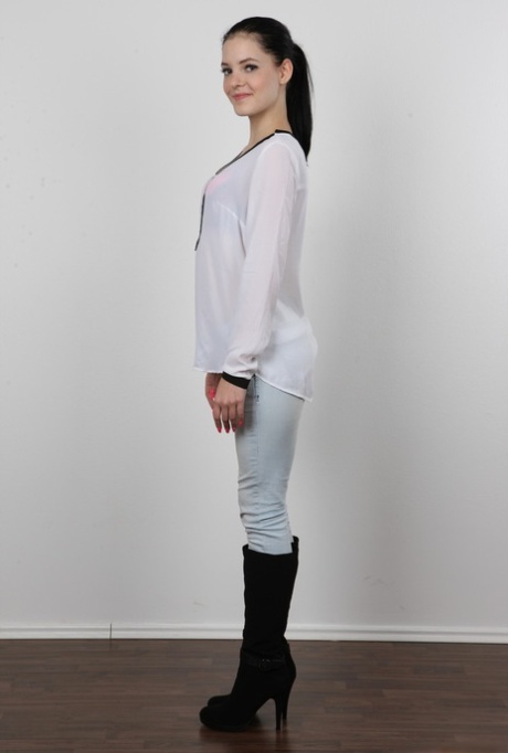 Cute teen Aneta peels her jeans to pose naked for a casting shoot