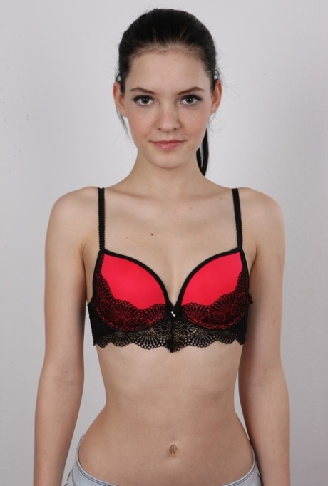 Cute teen Aneta peels her jeans to pose naked for a casting shoot