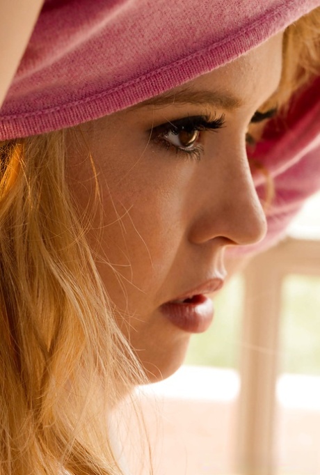 Naughty cutie exposing her pussy and tits with hard nipples in close up