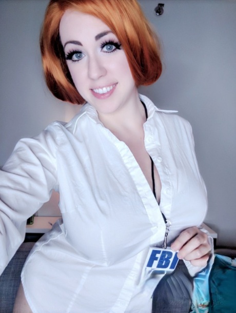 Super hot redhead Kayla Kiss in black lace underwear reveals her big tits