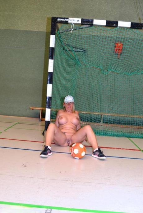 Busty mature fatty gets fitness coaching while stark naked in the school gym