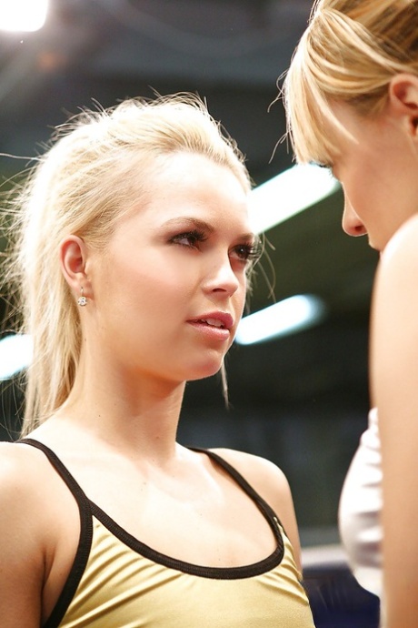 Stunning sporty lesbians get some pussy pleasure after wrestling