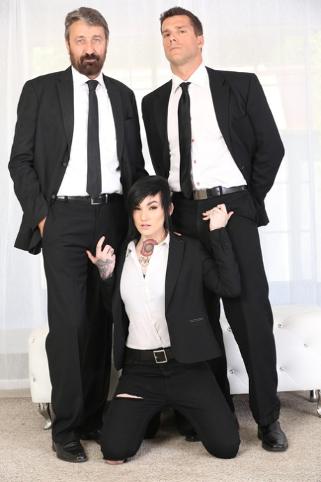 Dark haired girl Nikki Hearts has sex with 2 male co-workers at the same time