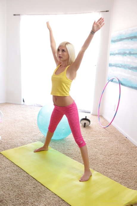 Flexible young yogi Piper Perri shows off her agility skills with a big cock