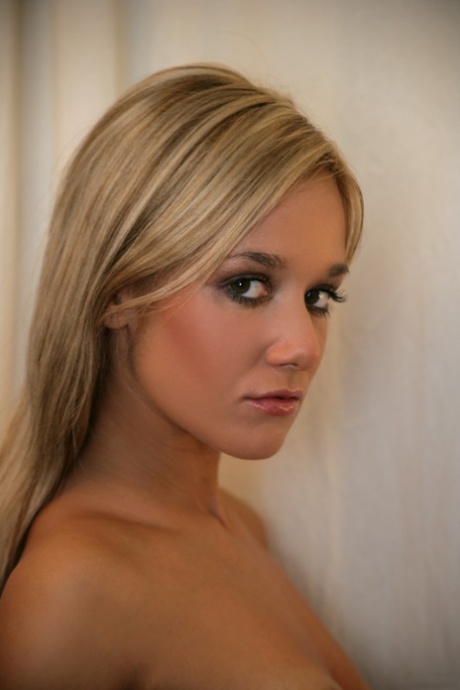 Blonde girlfriend Lisen A shows her adorable breasts and poses naked