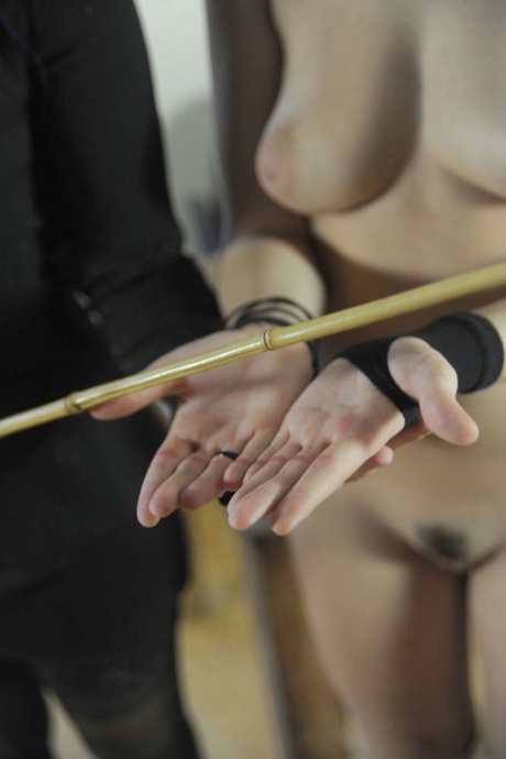 Angry lezdom teacher whips naughty student on her naked ass while bound