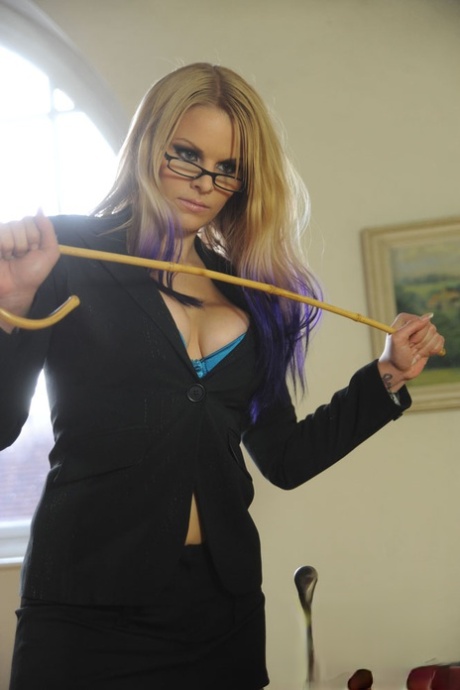 Angry lezdom teacher whips naughty student on her naked ass while bound