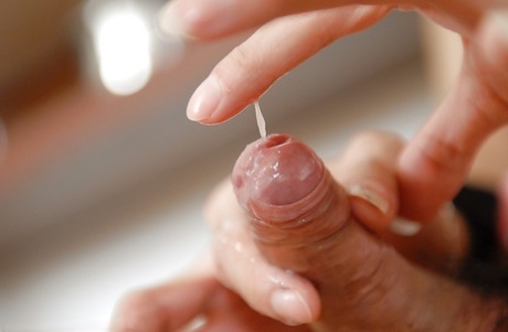 Skinny Asian tranny Micky jerking her stiff rod in fishnet stockings