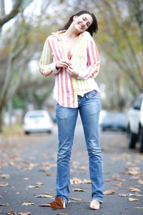 Adorable brunette babe Darya showing off her hairy cunt outdoors