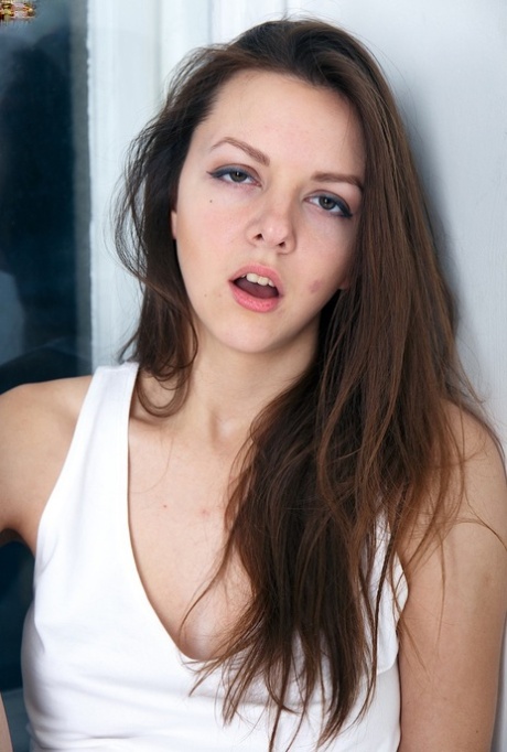 Sweet teen girl fingers her bum while posing in the nude for the first time