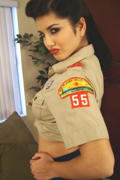 Indian MILF Sunny Leone teasing in red boots & a slutty scouting outfit