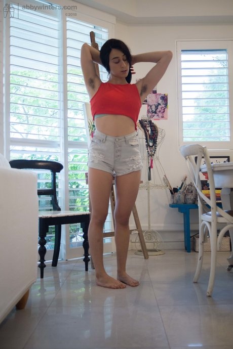 Sexy amateur Violet R reveals underarm hair & firm ass while getting dressed