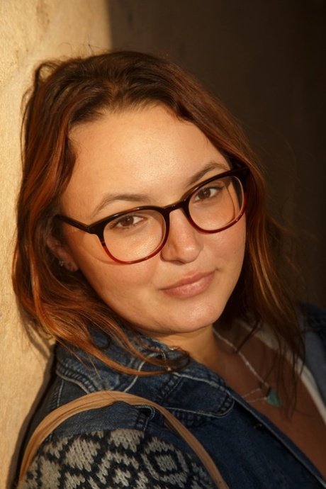 Cute brunette Tammy Kaimia flashes big round tits and juicy thighs