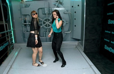 Fully clothed girl dance and get soaking wet during sprinkler malfunction