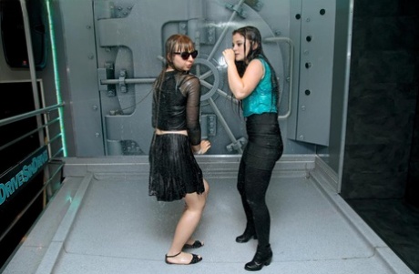 Fully clothed girl dance and get soaking wet during sprinkler malfunction