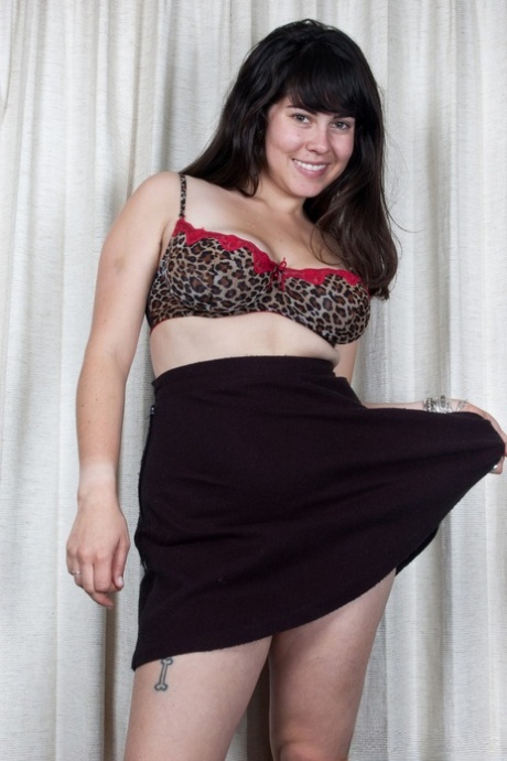 Busty amateur wife Cleo spreading her super hairy vulva on the carpet