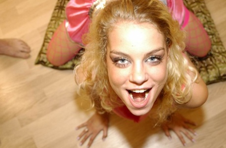 Blonde slut Angelz Silky swallows cum while sucking cocks during a gangbang