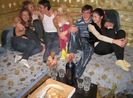 Young girls engage in group sex while attending a pizza party