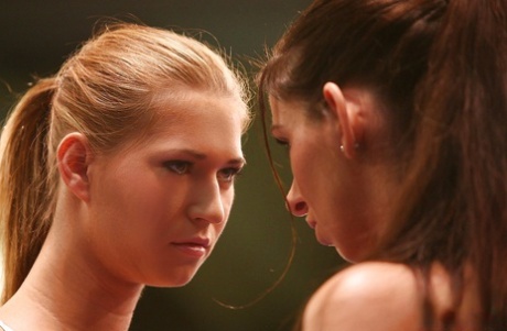 Rough catfight of two sporty MILFs ends up with lesbian sex