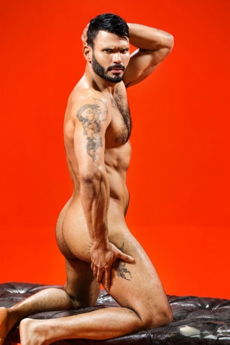 Muscled lovers Jean Franko and Francois Sagat fucking on the flat soft bench