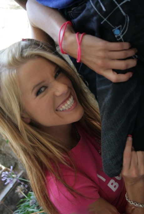 Cute blonde in shorts sucks a big black cock and gets drowned in cum